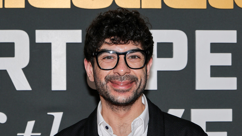 Tony Khan smiles for the camera