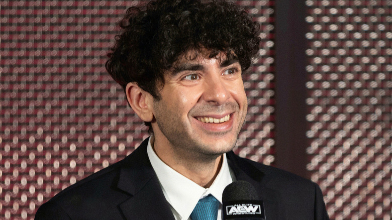 AEW CEO Tony Khan smiling