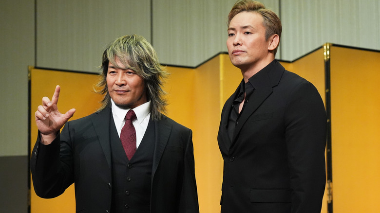 Hiroshi Tanahashi and Kazuchika Okada standing next to one another