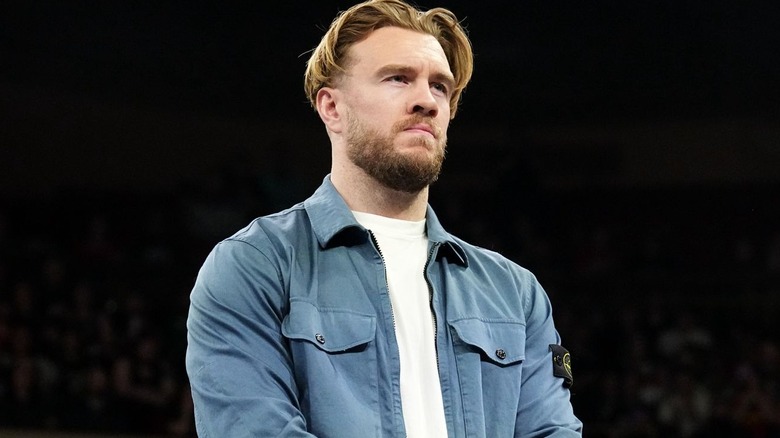 Will Ospreay wearing a blue shirt