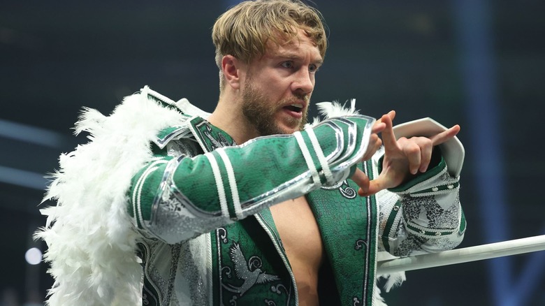 Will Ospreay wearing a green ring jacket