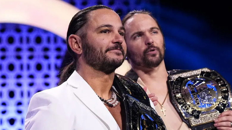 The Young Bucks holding the AEW Tag Team Championships