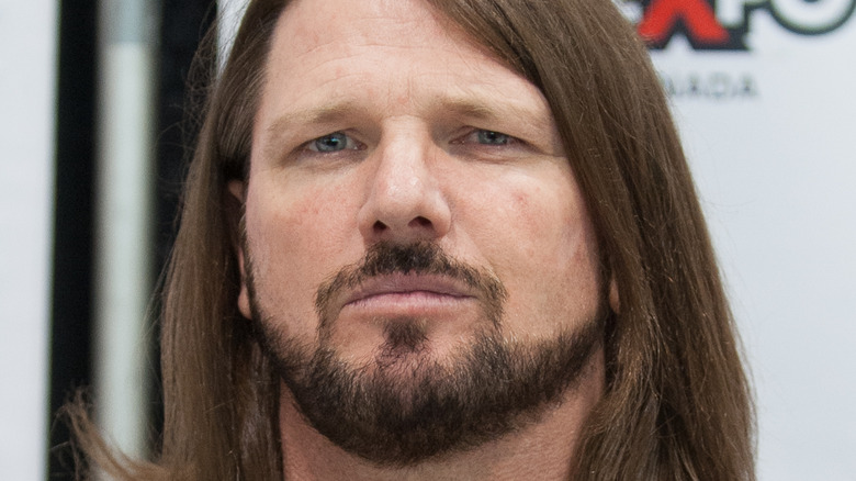 AJ Styles smirking