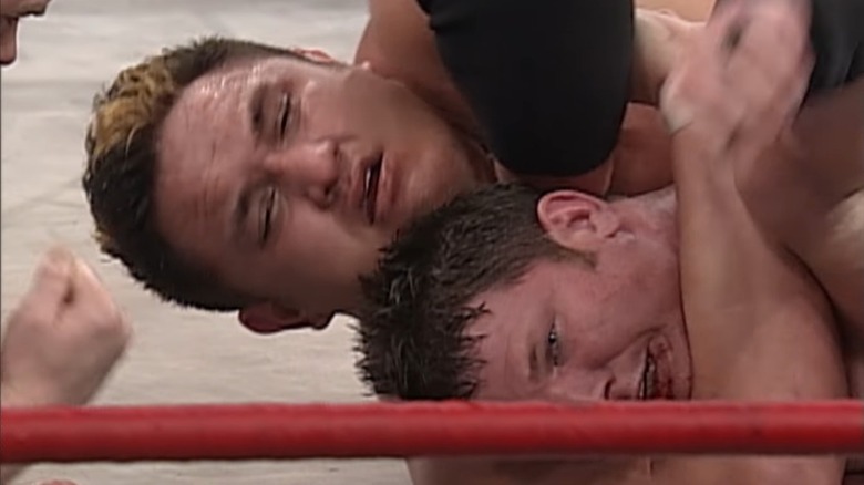 Samoa Joe and AJ Styles at TNA Turning Point 2005