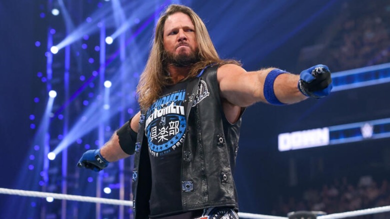 AJ Styles poses in the middle of the ring before a match on "WWE SmackDown."
