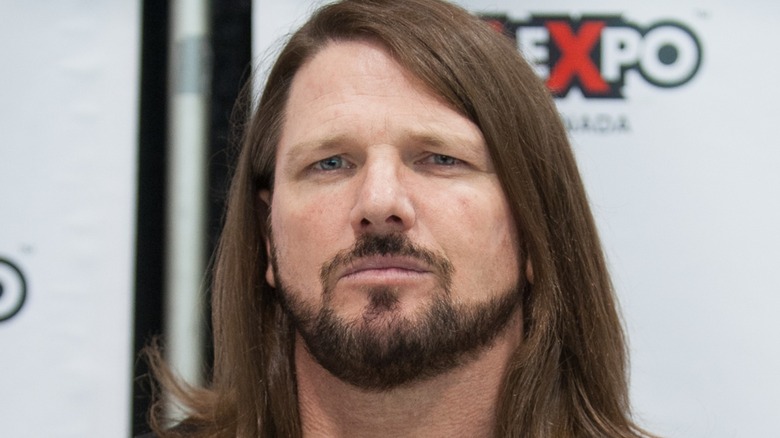 AJ Styles furrowing his eyebrows