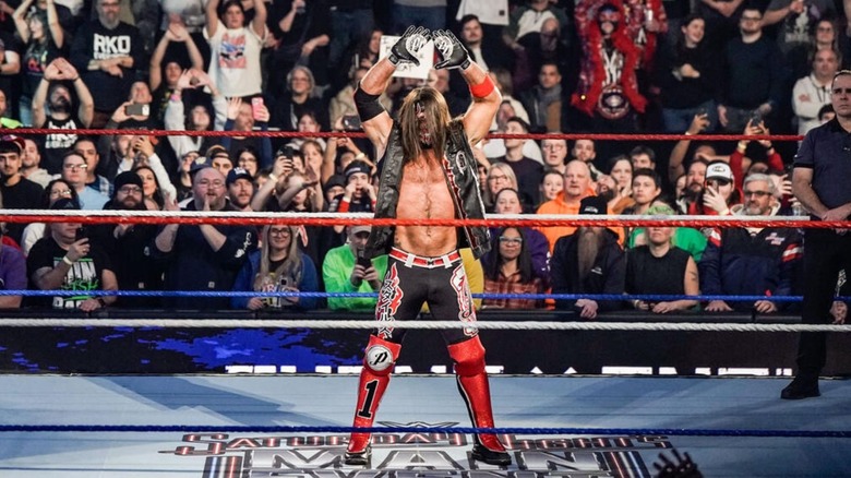 AJ Styles poses in the ring ahead of his match against Shinsuke Nakamura at Saturday Night's Main Event.