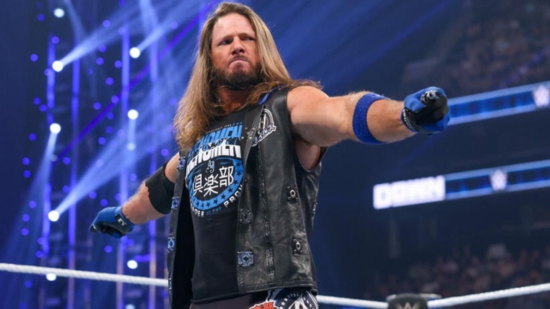 AJ Styles poses in the middle of the ring