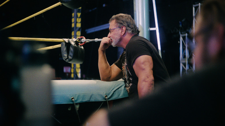 Al Snow watching wrestling ring