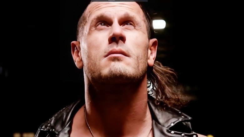 Alex Shelley looks up