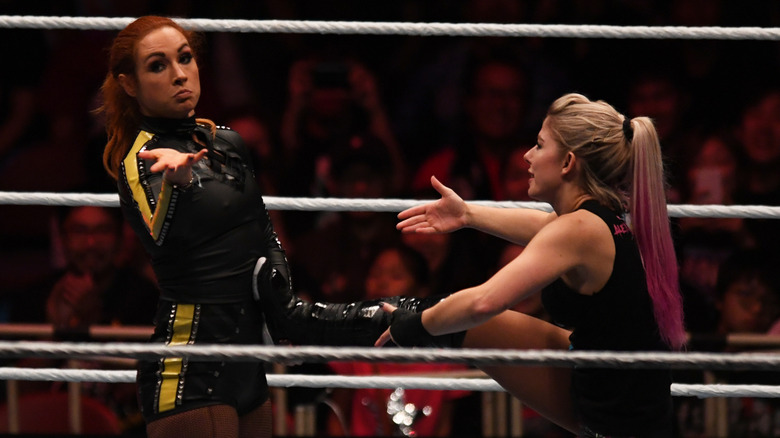 Becky Lynch and Alexa Bliss compete during the WWE Live Tokyo at Ryogoku Kokugikan