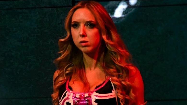 TNA Knockouts World Tag Team Champion Allie looks shocked after hearing some bad news about Rosemary