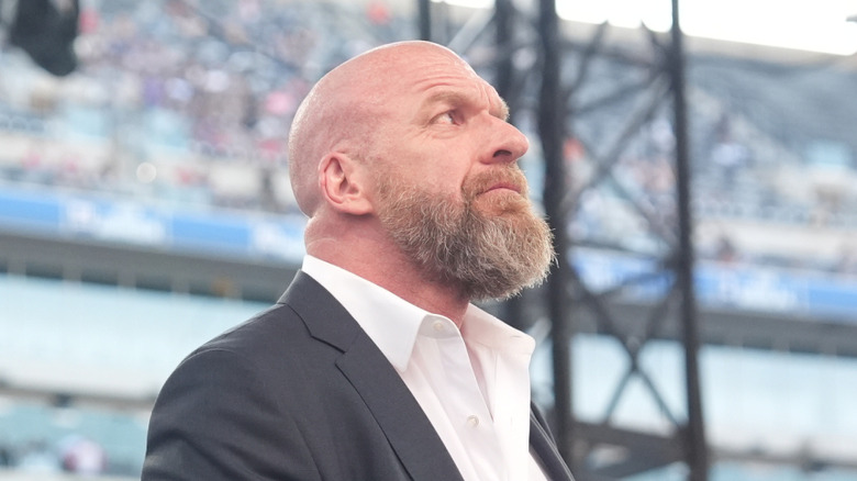 Triple H staring into the crowd