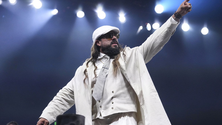 Andrade El Idolo poses on the ropes for fans after a segment on the July 22, 2026 edition of 