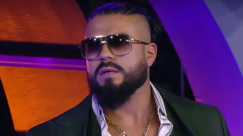 Andrade El Idolo wearing shades