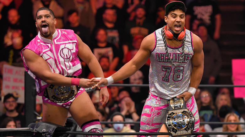 The Acclaimed scissor with their title belts