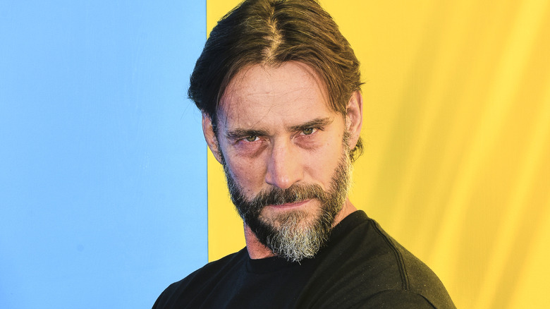 CM Punk stares