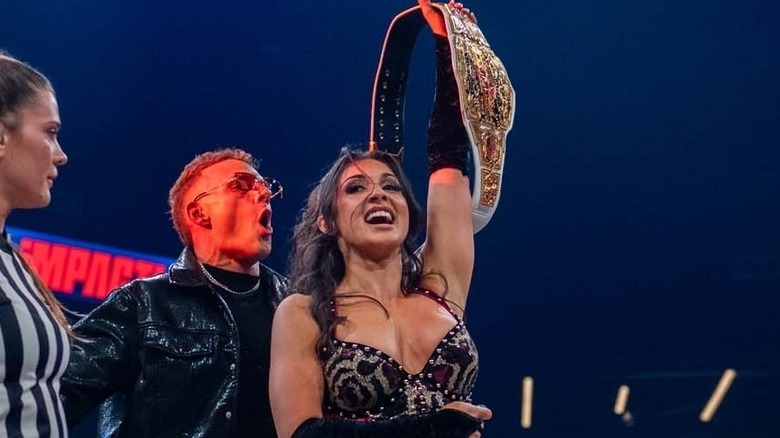 Arianna Grace smiles on after successful TNA Knockouts World Title defense