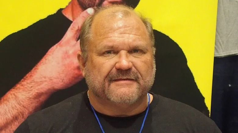 Arn Anderson poses at a signing.