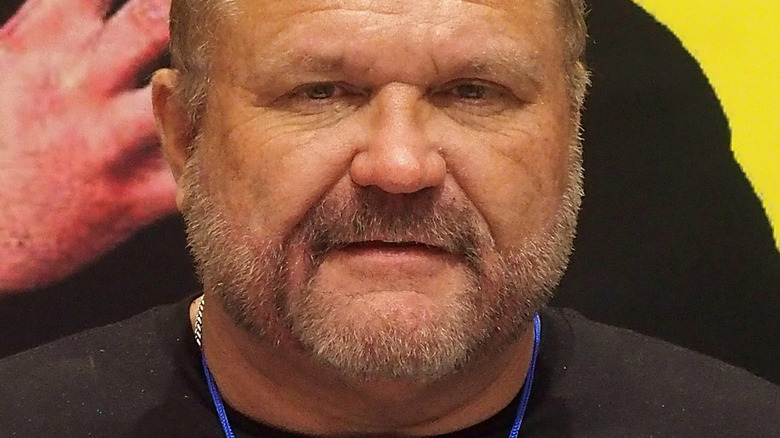 Arn Anderson looking into camera