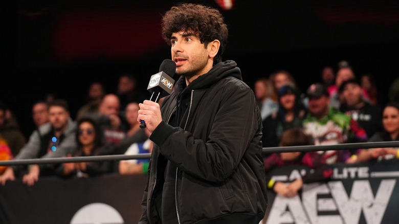 AEW President Tony Khan addresses the fans at an AEW live event