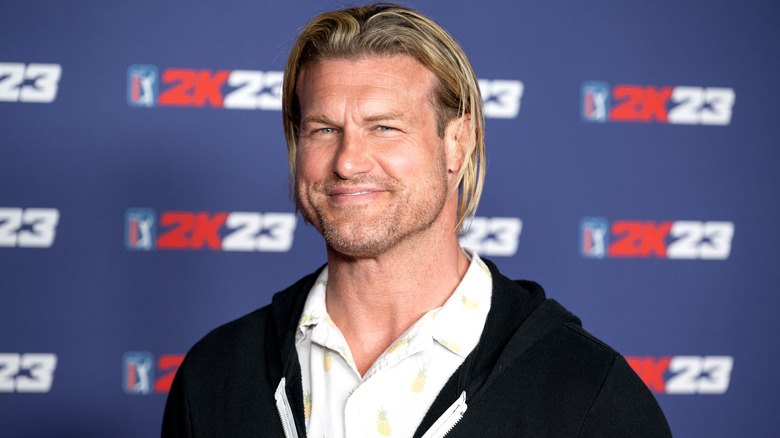 Former WWE superstar Dolph Ziggler poses at a red carpet event for 2K.