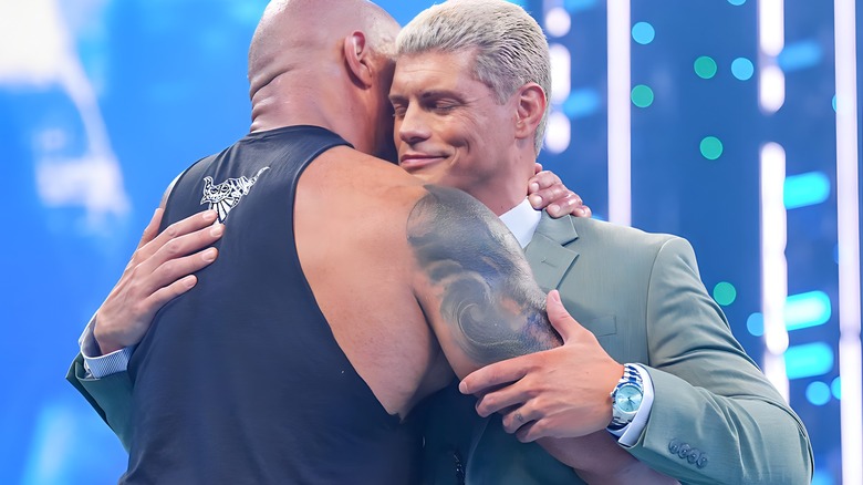 The Rock hugs Cody Rhodes