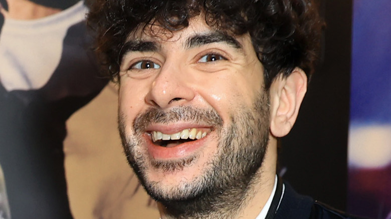 AEW CEO Tony Khan smiling