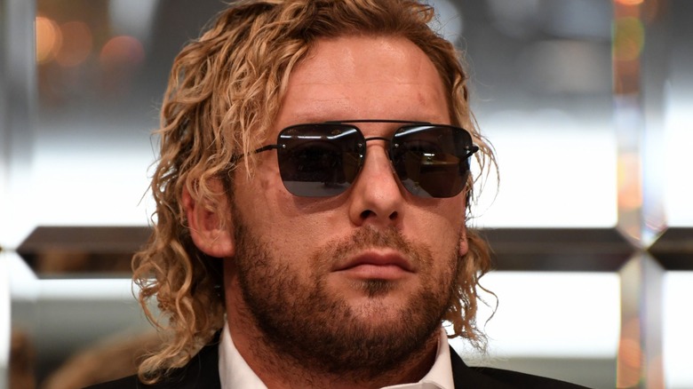 Kenny Omega wearing sunglasses