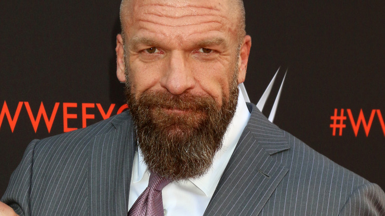 Triple H smiles 