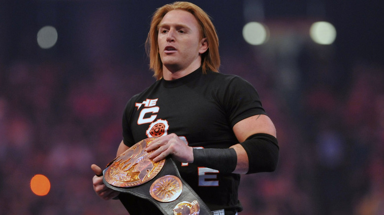 Heath Slater holding WWE Tag Title