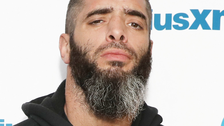 Mark Briscoe posing at a press event 