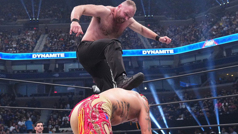 jon Moxley delivers a curb stomp to Rey Fenix