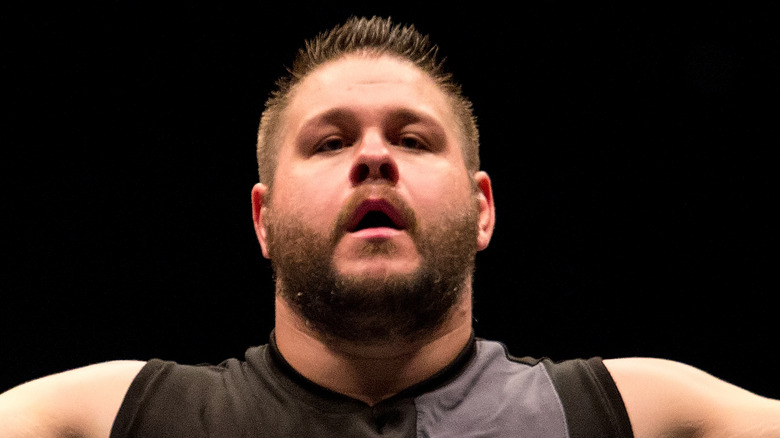 Kevin Owens posing