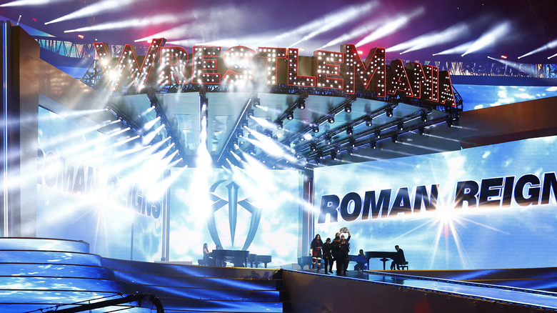 Roman Reigns, Solo Sikoa and Paul Heyman make their entrance down the ramp during Wrestle Mania 39.