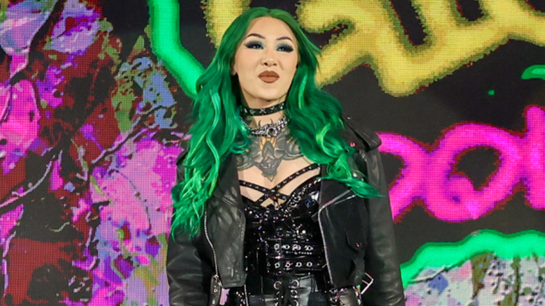 Shotzi wearing a leather jacket