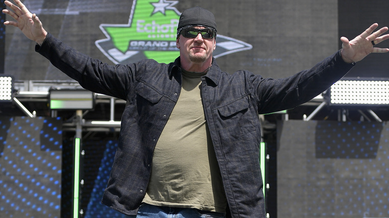 The Undertaker posing on stage