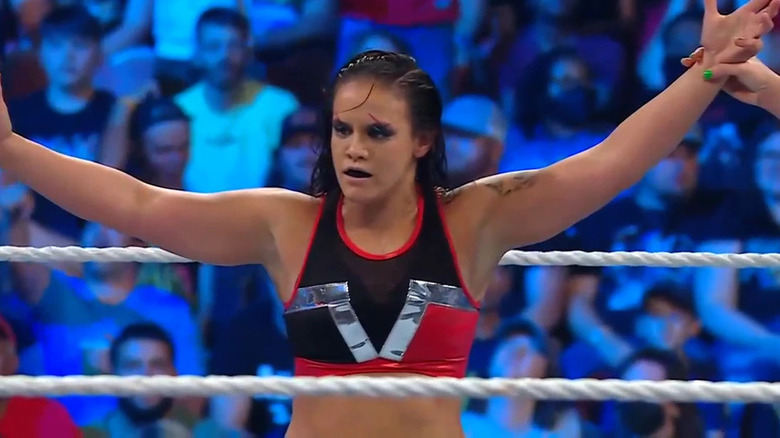 Shayna Baszler with arms out