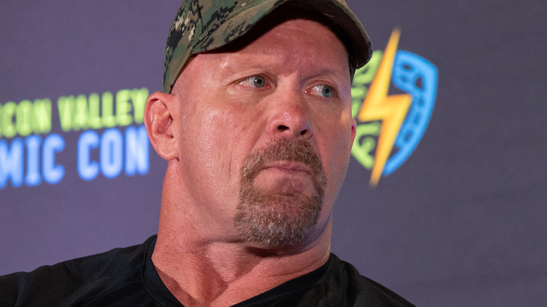 Steve Austin wearing a baseball cap