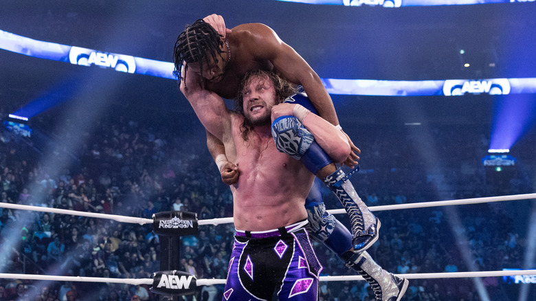 AEW World Champion Kenny Omega sets up to hit challenger Kevin Knight with the One-Winged Angel during their title match at AEW Redemption 2026.