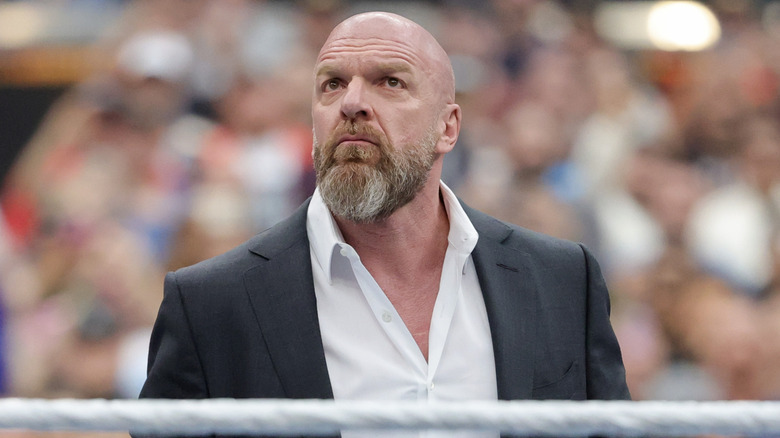 WWE CCO Triple H takes in the admiration of the crowd before welcoming them to WrestleMania