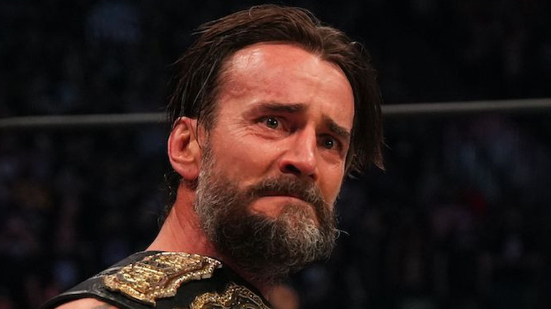 CM Punk looks concerned in AEW ring