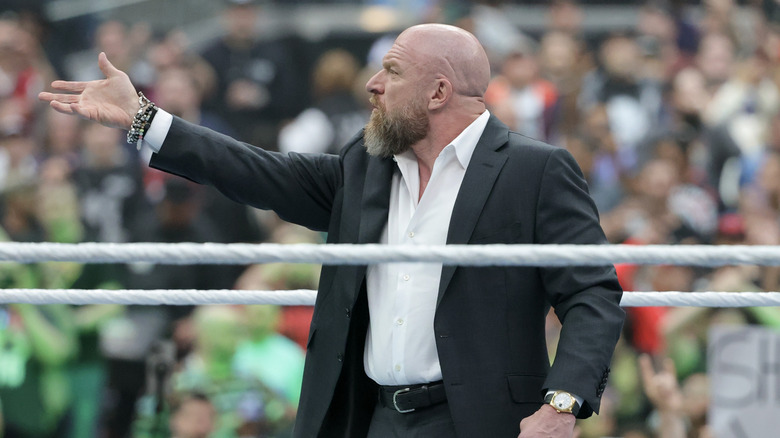 Triple H pointing away