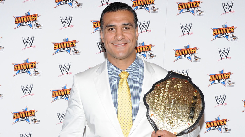 Alberto Del Rio with the WWE World Heavyweight Championship, 2013