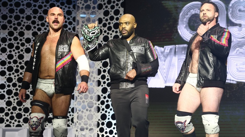 FTR (Dax Harwood and Cash Wheeler) alongside Stokely Hathaway during a recent episode of 