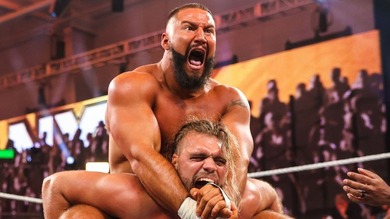 Bron Breakker performing a submission on Von Wagner