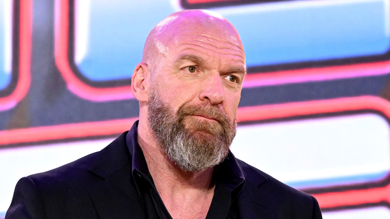 Triple H giving a 