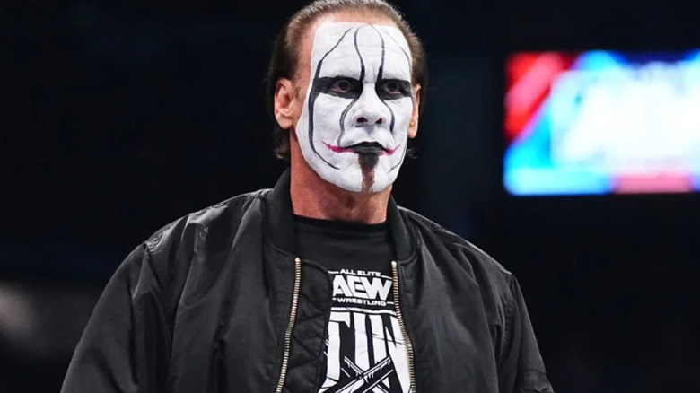 Sting wearing black and white face paint 