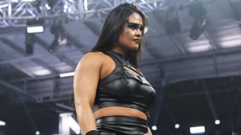 Nikki Blackheart standing tall