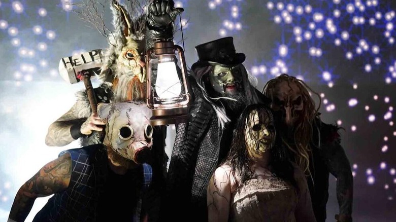All five members of the Wyatt Sicks size up their challengers by staring them down